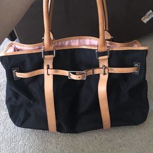 Tumi reversible satchel